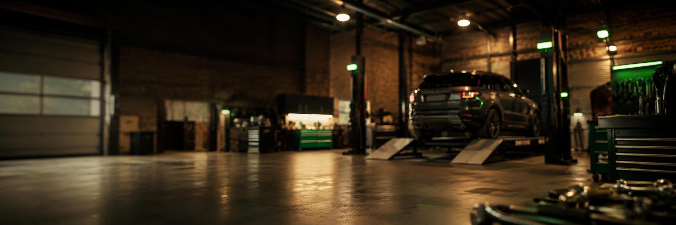 Land Rover workshop background with Range Rover Sport on ramp after successful SDV6 engine replacement